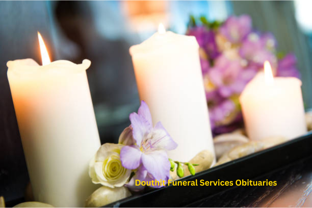 A memorial service with flowers and candles symbolizing remembrance.